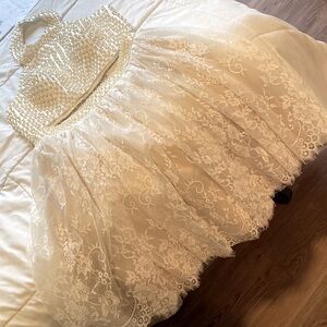 Breathtaking, white wedding, dress or potentially the reception dress